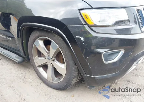 2014 Jeep Grand Cherokee Overland z USA, uszkodzony, nr VIN 1C4RJFCG4EC415991